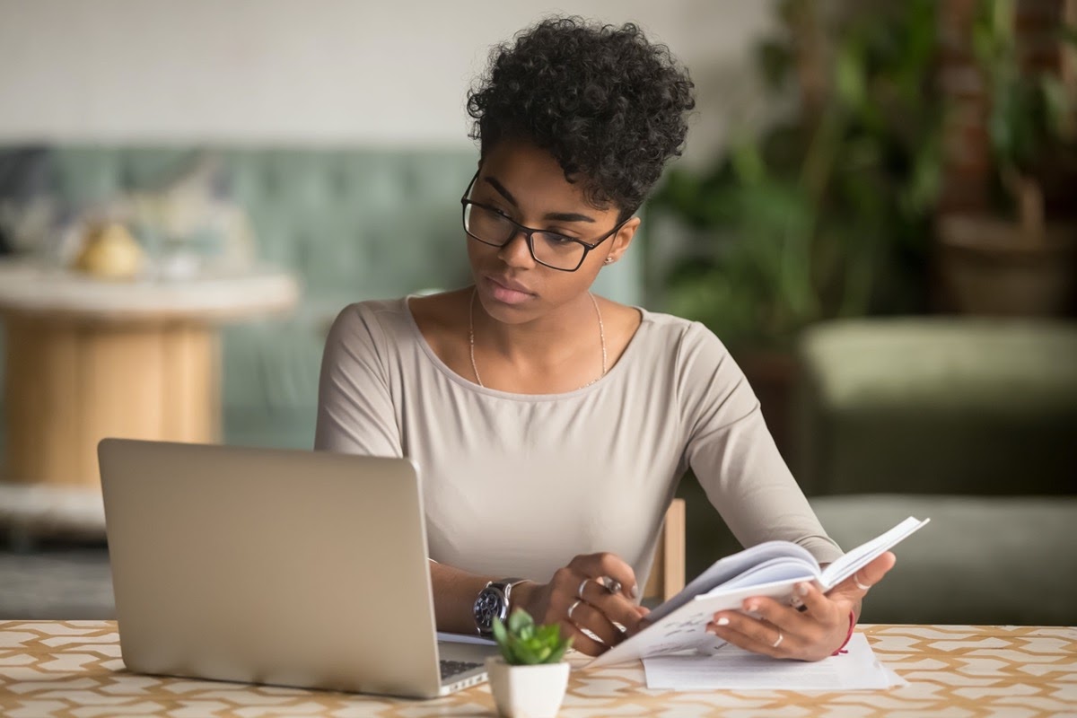 woman at laptop; How Unions have Supported Black Lives Matter concept